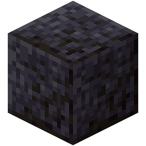 Un bloc de pierre noire polie. 