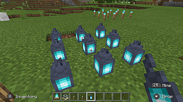 Neuf lanternes d'âme au sol dans Minecraft.