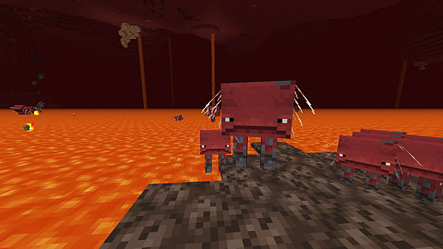 Un Strider debout sur un rocher près de lave dans Minecraft 1.16.