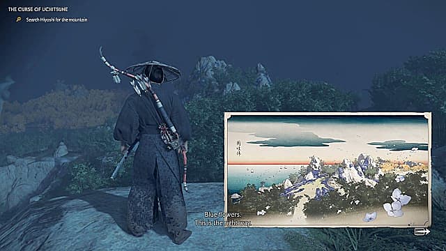Jin debout sur une falaise regardant une montagne décrite par une œuvre d'art. 