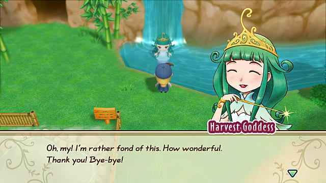 La déesse de la récolte remercie le joueur pour un objet près d'un étang et d'une cascade. 