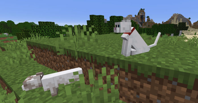 An untamed and tamed cat in Minecraft