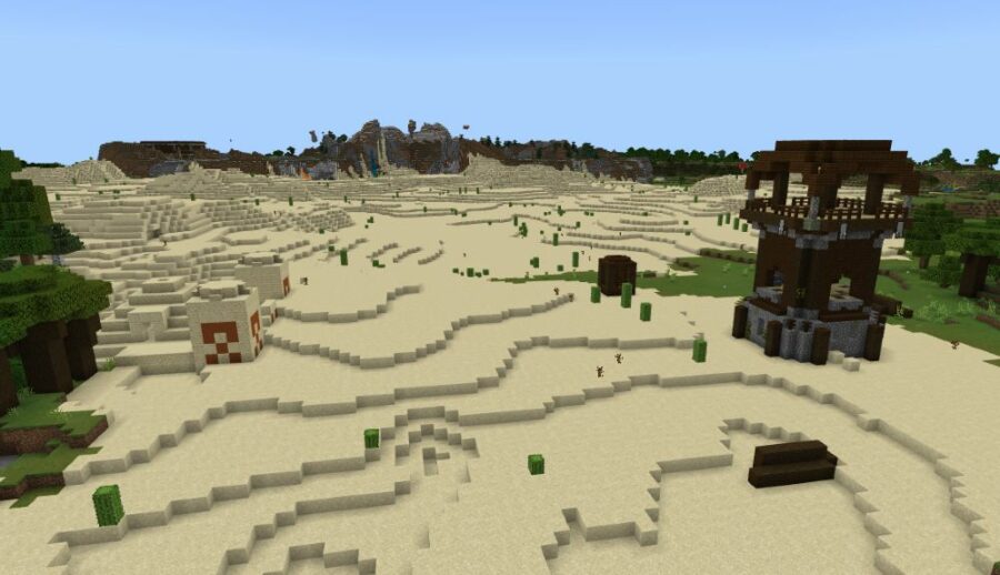 Un avant-poste de pilleur près d'un temple du désert dans Minecraft.
