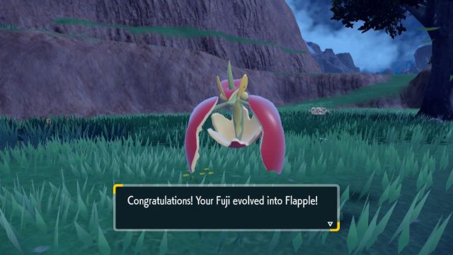 Le joueur fait évoluer Applin en Flapple dans Pokemon Scarlet & Violet