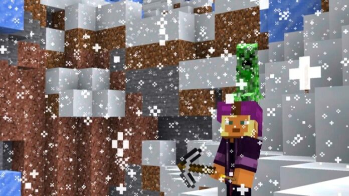 Standing in snow with a pickaxe