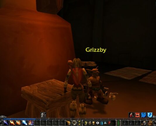 Grizzby standing in Ratchet Inn