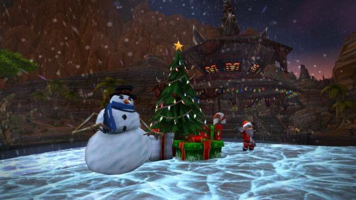 Winterveil event set up in World of Warcraft with snowman and tree