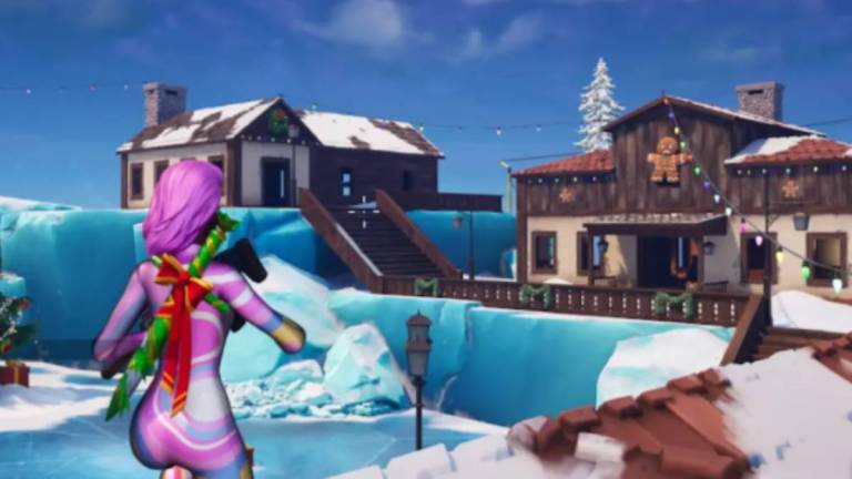 Character overlooking winterburg island in fortnite winterfest.