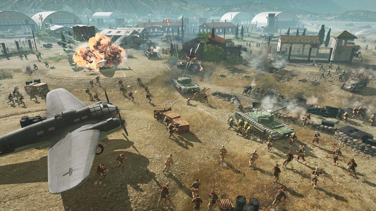 Un champ de bataille avec des avions, des troupes et des explosions dans Company of Heroes 3