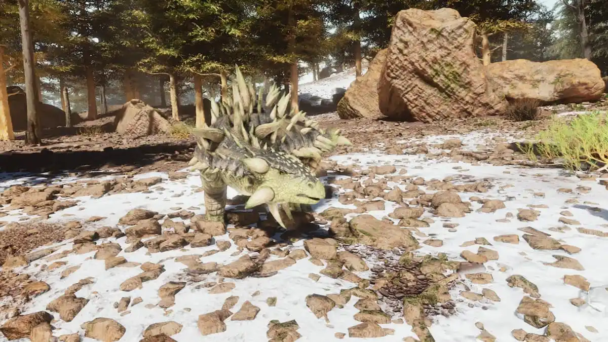 Ankylosaure sur un sol saupoudré de neige.