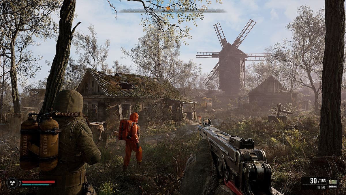Un joueur harceleur et ses alliés s'approchent d'un moulin à vent au cœur des harceleurs de Tchernobyl.