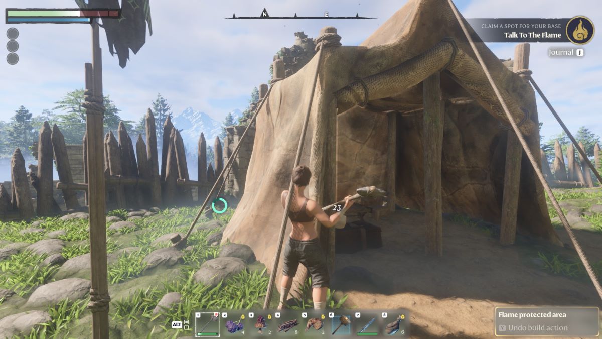 Le joueur détruisant une tente dans Enshrouded