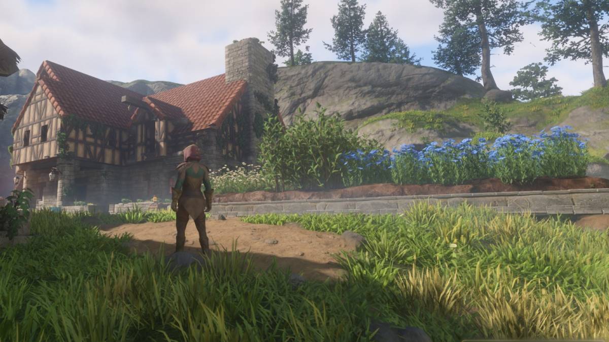 Une ferme et une maison créées par les joueurs à Enshrouded