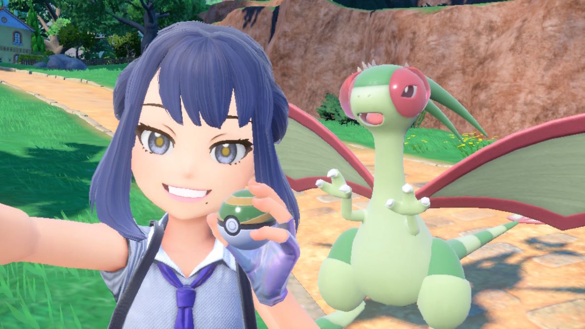 La joueuse et son Flygon posent pour une photo dans Pokémon Écarlate et Violet