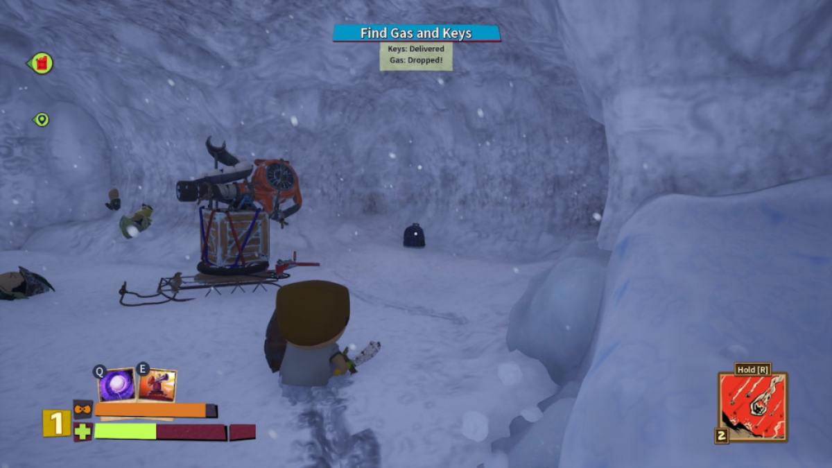 Joueur regardant un sac à dos à côté d'une tourelle à neige dans une grotte lors de la Journée de neige de South Park