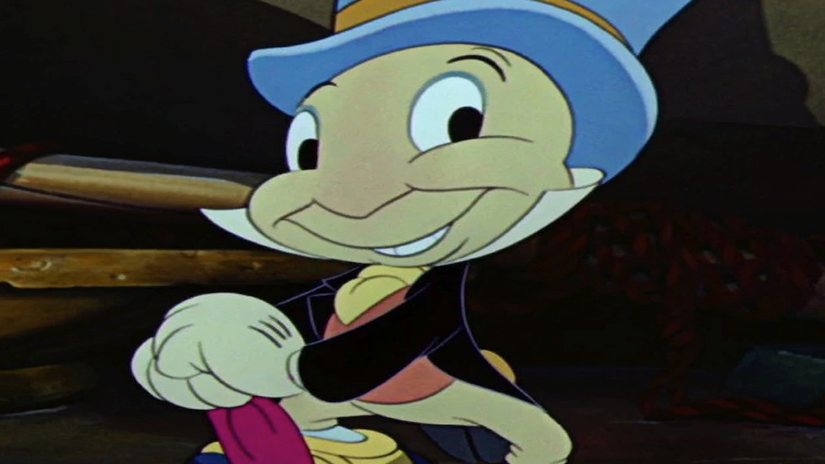 Jiminy Cricket avec parapluie rouge et chapeau bleu, souriant