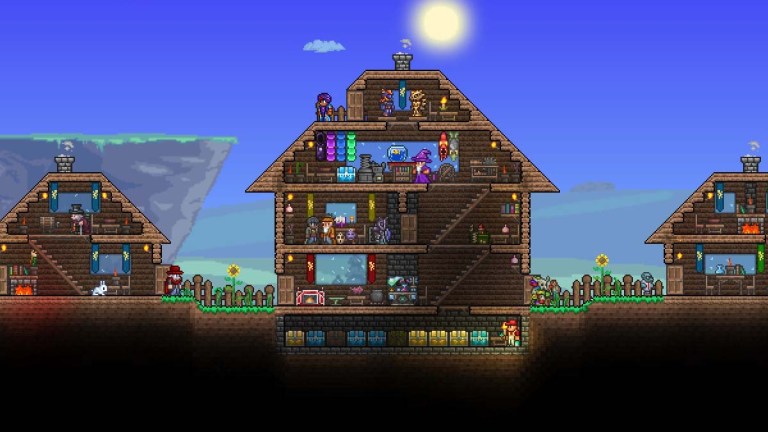 Three houses stands next to each other in Terraria