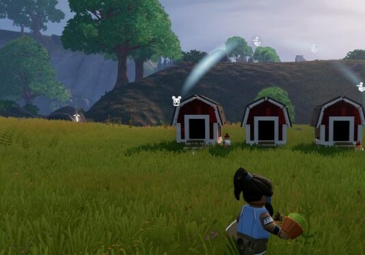 Player holding an Animal treat and three barns in the distance, chickens and a pig roaming