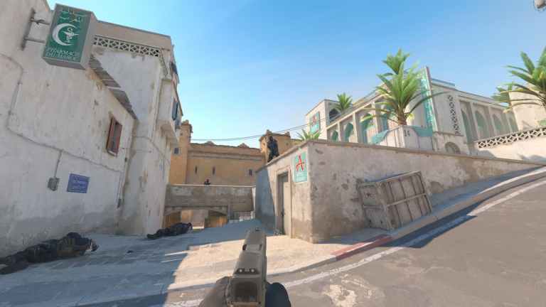 Dust 2 in CS2, A site, T aiming at a CT