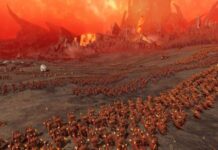 Hordes of warriors attack each other in Warhammer 3