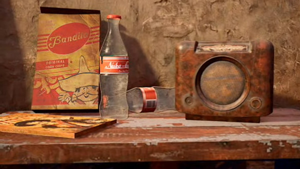 Une table avec une radio, une bouteille vide de Nuka Cola et un sac de chips.