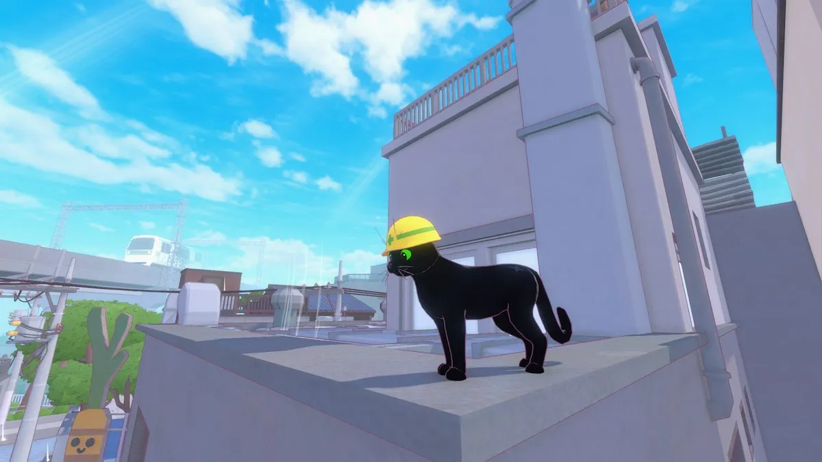 Petit chaton sur un toit, portant un casque de sécurité à Little Kitty, Big City.
