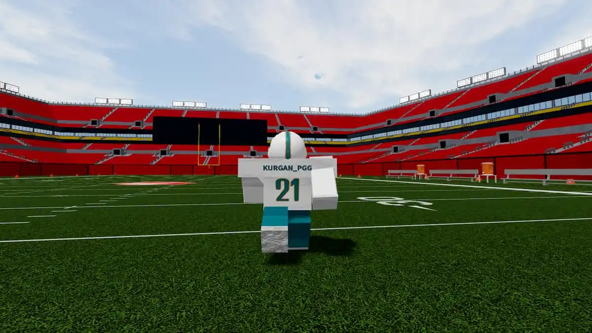 Joueur de Football Fusion 2 en uniforme des Dolphins de Miami courant sur le terrain de football