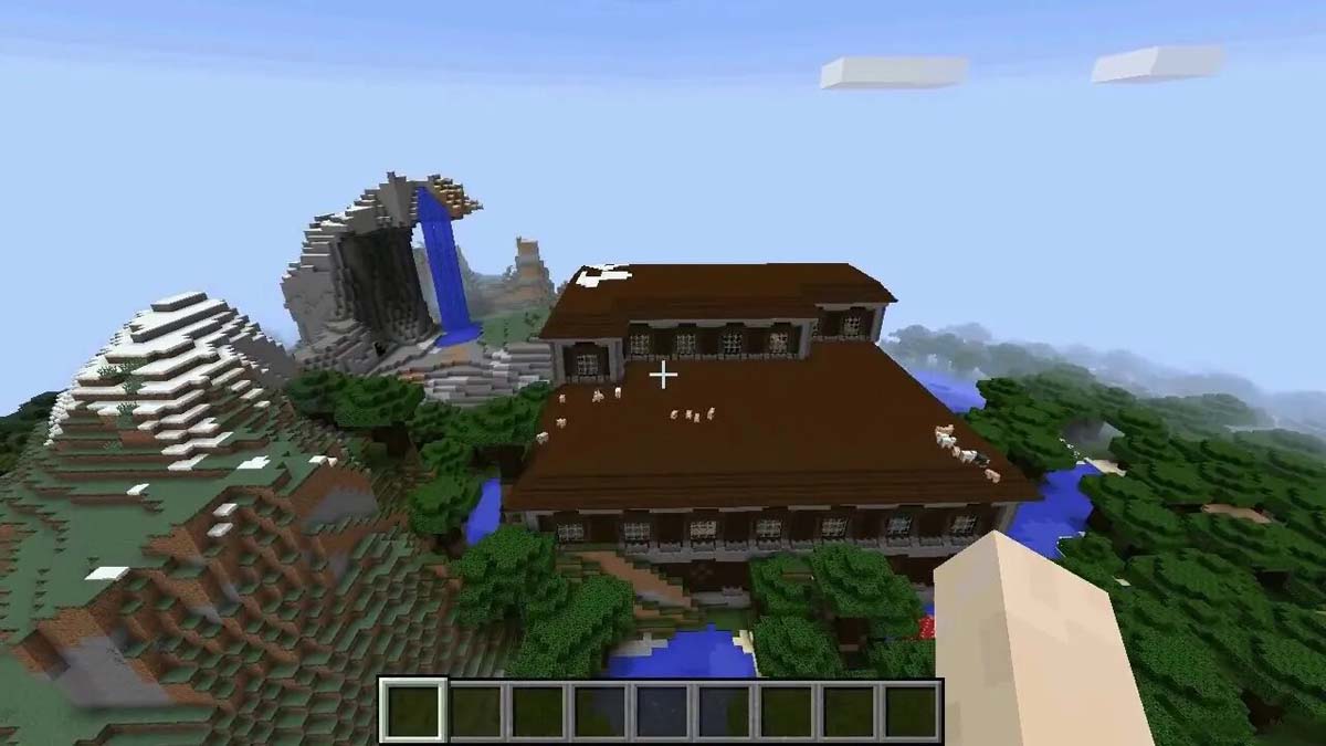 Cascade et manoir boisé dans Minecraft