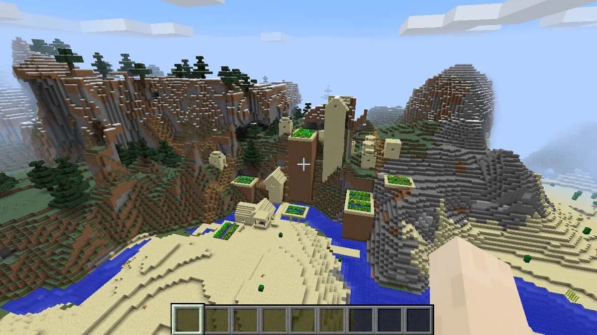 Collines enneigées et village désertique dans Minecraft