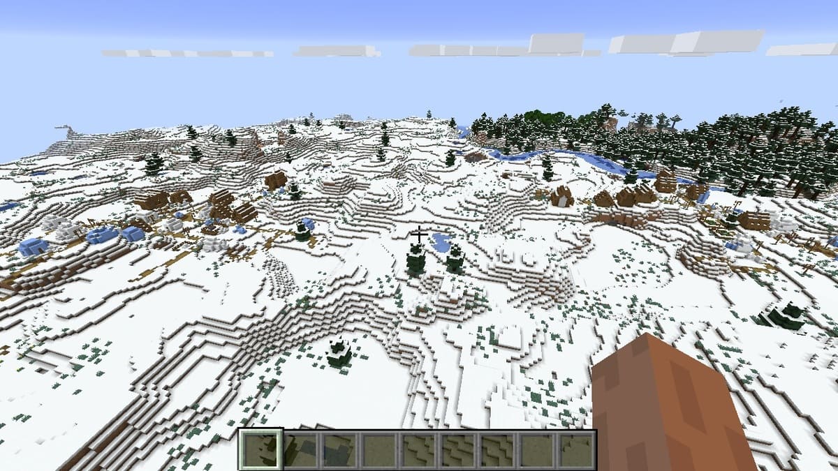 Deux villages de plaines enneigées dans Minecraft