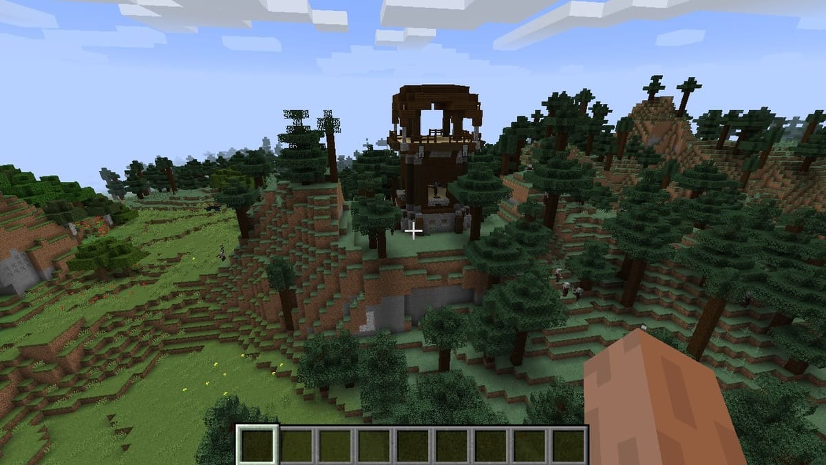 Avant-poste de pilleurs sur la colline dans Minecraft