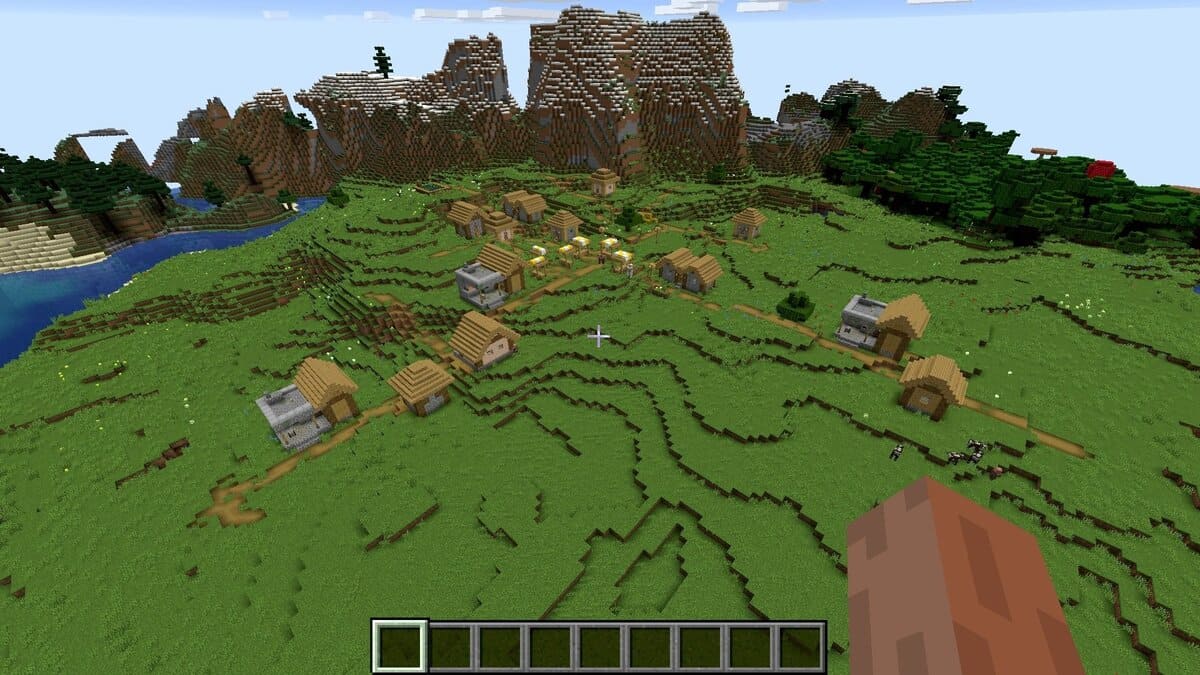 Trois forgerons et village dans Minecraft