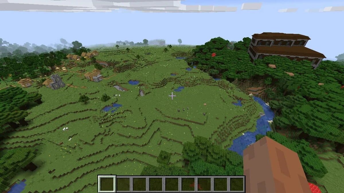 Manoir et village boisés dans Minecraft