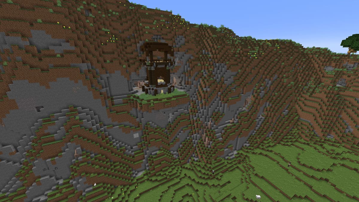 Avant-poste de pilleur à l'intérieur d'une grotte dans Minecraft