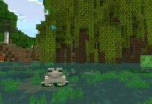 A frog sits on the mangrove swamp in Minecraft