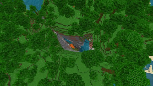 Un ravin de grotte luxuriant rempli d'eau et de lave à Minecraft