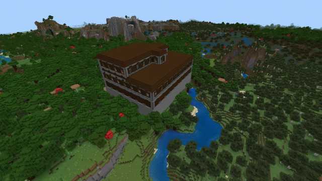 Un imposant manoir Minecraft Woodland à côté d'une forêt de bouleaux