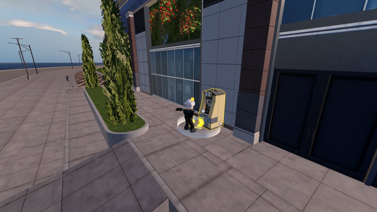 Image montrant un joueur pillant un guichet automatique dans Driving Empire